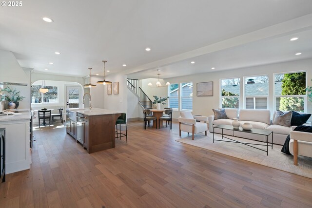 3660 SE Henderson St, Portland, OR 97202 - living room featuring recessed lighting, a notable chandelier, and wood finished floors
