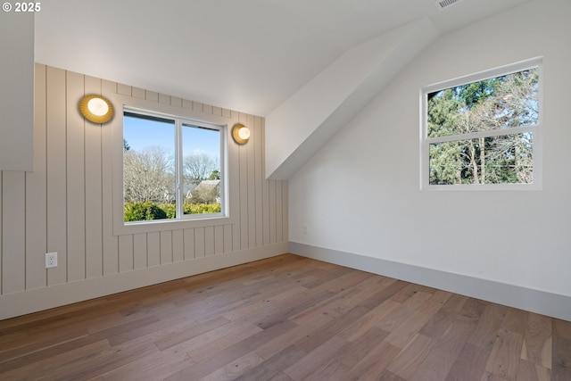 3660 SE Henderson St, Portland, OR 97202 - additional living space featuring baseboards and wood finished floors