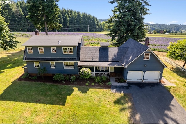17753 Powers Creek Loop Rd, Silverton, OR 97381 - view of front of house with driveway, a porch, a front yard, an attached garage, and a chimney