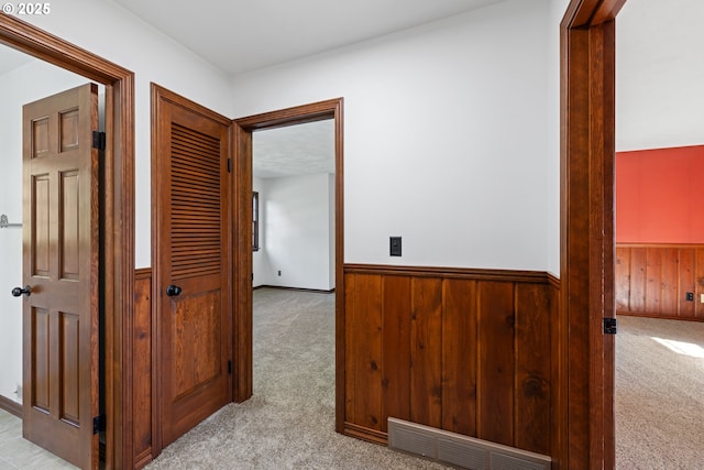 17753 Powers Creek Loop Rd, Silverton, OR 97381 - hall featuring light colored carpet, wainscoting, and wooden walls
