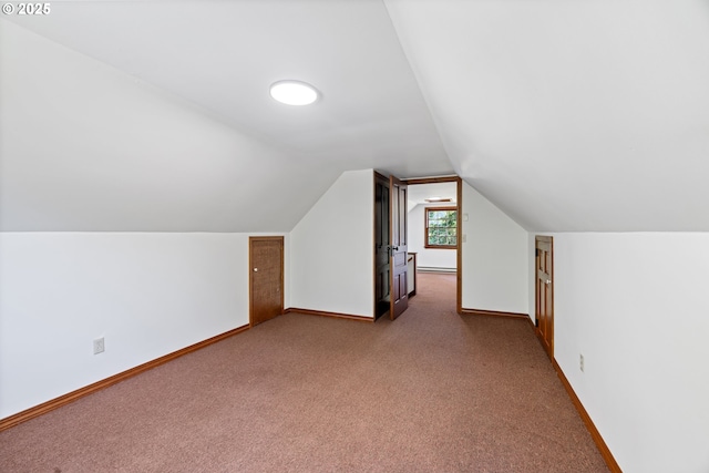 17753 Powers Creek Loop Rd, Silverton, OR 97381 - additional living space featuring carpet flooring, vaulted ceiling, and a baseboard heating unit