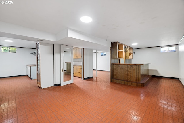 17753 Powers Creek Loop Rd, Silverton, OR 97381 - below grade area featuring brick patterned flooring and a dry bar