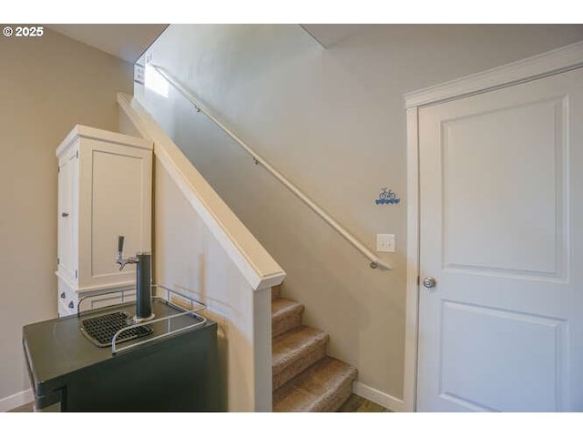 stairway with baseboards