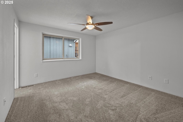 345 S 11th St, Saint Helens, OR 97051 - carpeted empty room featuring ceiling fan, healthy amount of natural light, and a textured ceiling