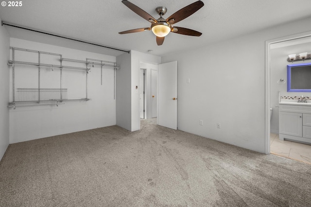 345 S 11th St, Saint Helens, OR 97051 - unfurnished bedroom featuring carpet flooring, a sink, ensuite bathroom, and ceiling fan