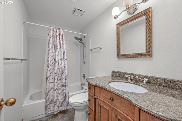 345 S 11th St, Saint Helens, OR 97051 - bathroom with shower / tub combo, toilet, vanity, and stone finish flooring