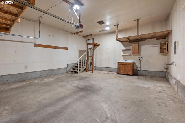 345 S 11th St, Saint Helens, OR 97051 - garage featuring a garage door opener and a sink
