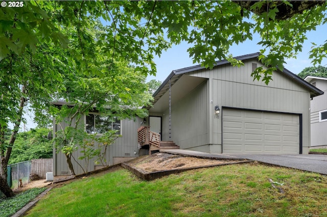 345 S 11th St, Saint Helens, OR 97051 - view of front of house featuring an attached garage and driveway
