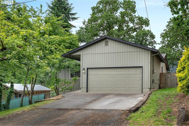 345 S 11th St, Saint Helens, OR 97051 - garage featuring asphalt driveway