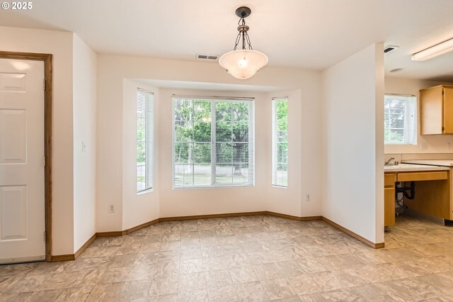 1006 NE 45th St, Vancouver, WA 98663 - unfurnished dining area with plenty of natural light and baseboards
