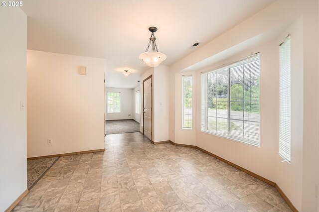 1006 NE 45th St, Vancouver, WA 98663 - unfurnished room featuring baseboards and stone finish floors