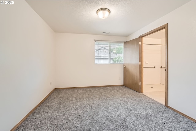 1006 NE 45th St, Vancouver, WA 98663 - unfurnished bedroom with carpet flooring, baseboards, and a textured ceiling