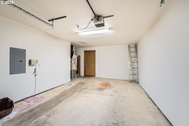 1006 NE 45th St, Vancouver, WA 98663 - garage with electric panel, a garage door opener, and water heater