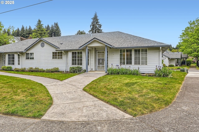 1006 NE 45th St, Vancouver, WA 98663 - single story home with a front lawn and roof with shingles