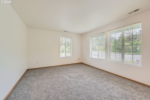 1006 NE 45th St, Vancouver, WA 98663 - spare room featuring carpet and baseboards