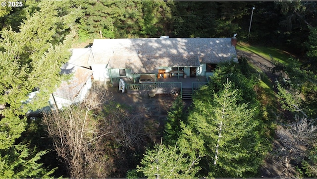 aerial view with a wooded view