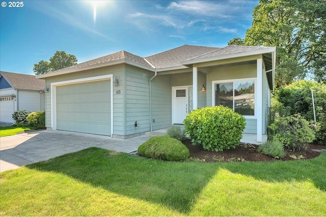 ranch-style home with an attached garage, a front lawn, concrete driveway, and a shingled roof