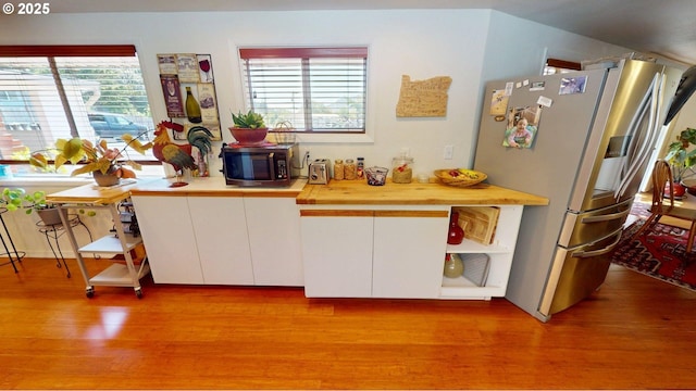 95169 Vista Loop, Gold Beach, OR 97444 - kitchen featuring stainless steel appliances, light wood finished floors, and healthy amount of natural light