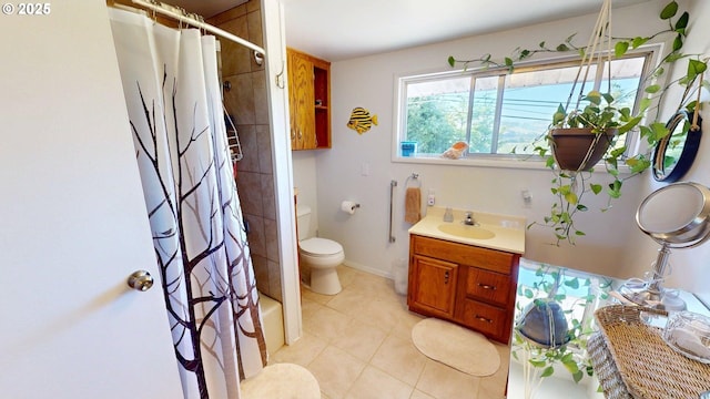 95169 Vista Loop, Gold Beach, OR 97444 - bathroom with vanity, toilet, tile patterned floors, baseboards, and shower / tub combo