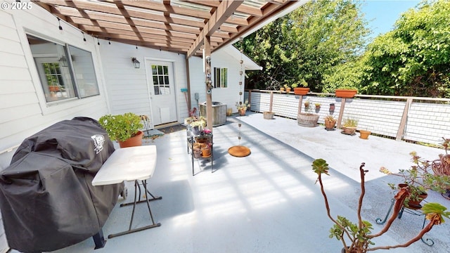 95169 Vista Loop, Gold Beach, OR 97444 - view of patio with a pergola, a grill, and cooling unit