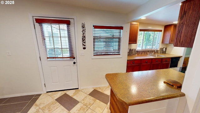 95169 Vista Loop, Gold Beach, OR 97444 - kitchen featuring a sink, baseboards, recessed lighting, and light tile patterned floors