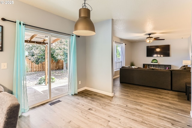 1219 34th Pl, Forest Grove, OR 97116 - living area featuring light wood-style flooring and a ceiling fan