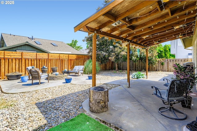 1219 34th Pl, Forest Grove, OR 97116 - fenced backyard featuring a patio area and an outdoor fire pit