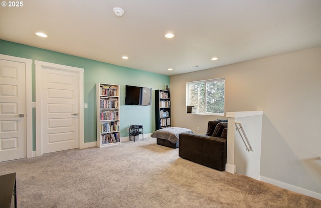 living area with carpet