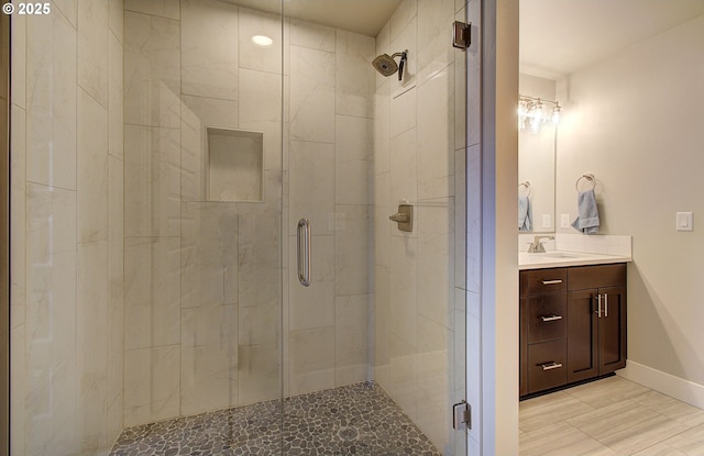 bathroom featuring vanity and walk in shower