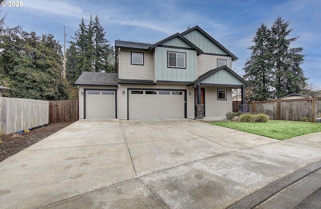 view of front of home featuring a garage and a front lawn