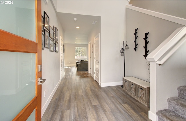 hall featuring dark wood-type flooring