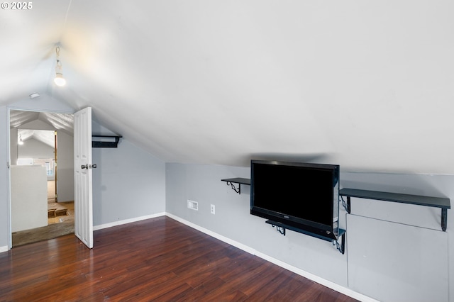 bonus room featuring lofted ceiling, wood finished floors, and baseboards