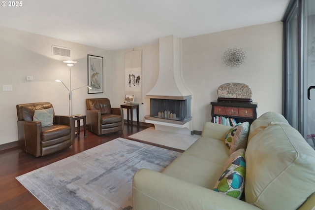 living room featuring dark wood-type flooring