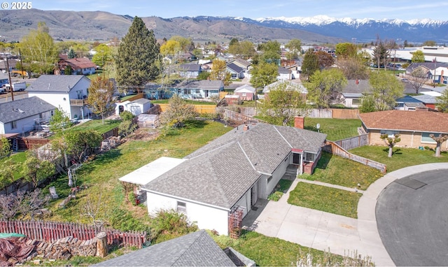 drone / aerial view with a mountain view and a residential view