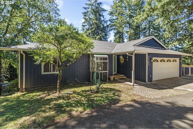 ranch-style home with a garage