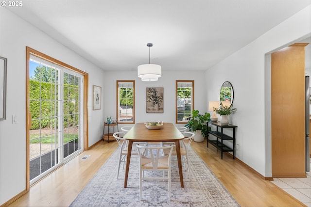 1281 NE Zachary St, Hillsboro, OR 97124 - dining area featuring light wood-type flooring and baseboards