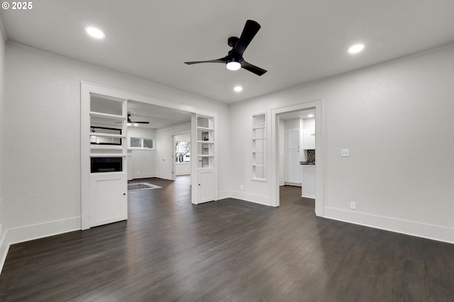 311 N 9th St, Cottage Grove, OR 97424 - unfurnished living room featuring ceiling fan, dark wood-type flooring, baseboards, recessed lighting, and a fireplace