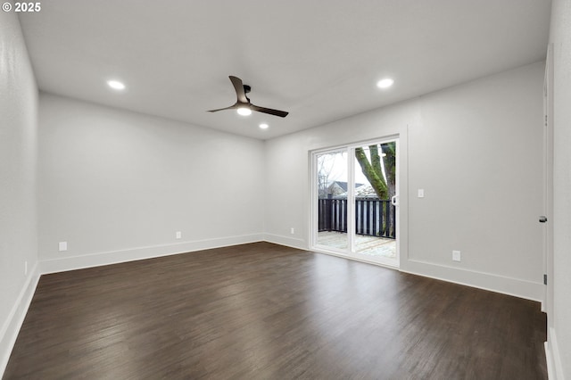 empty room with dark wood-type flooring, recessed lighting, ceiling fan, and baseboards