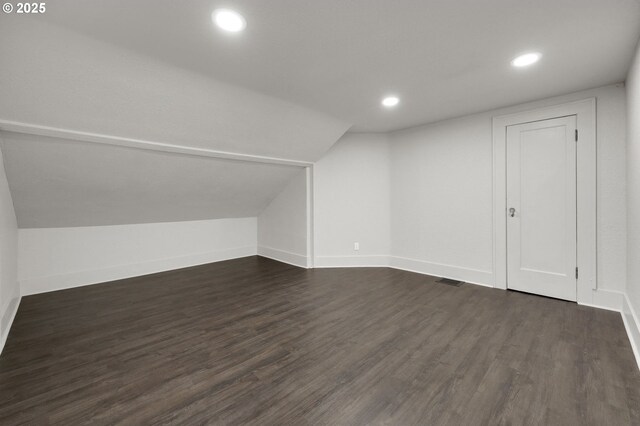 311 N 9th St, Cottage Grove, OR 97424 - additional living space with recessed lighting, dark wood finished floors, vaulted ceiling, and baseboards