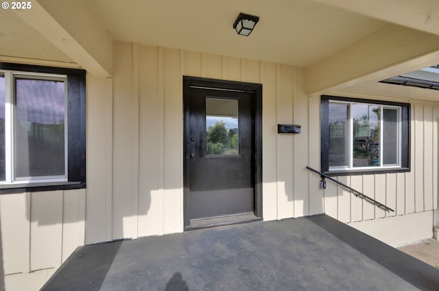 311 N 9th St, Cottage Grove, OR 97424 - entrance to property with a patio and board and batten siding