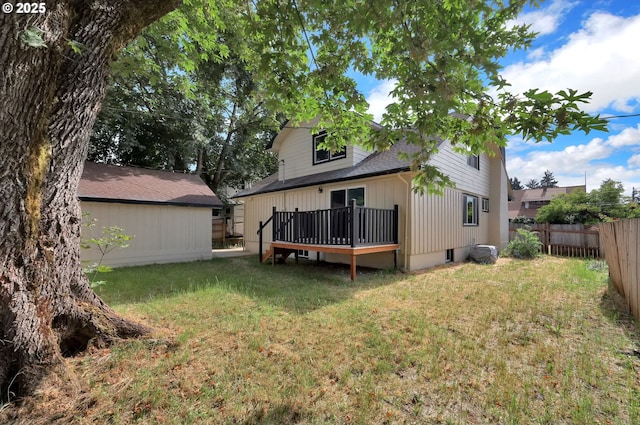 311 N 9th St, Cottage Grove, OR 97424 - rear view of house featuring a deck and roof with shingles