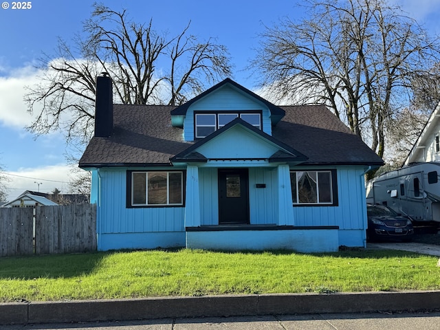 311 N 9th St, Cottage Grove, OR 97424 - bungalow-style house featuring a chimney and roof with shingles
