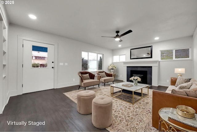 311 N 9th St, Cottage Grove, OR 97424 - living area with wood finished floors, a tile fireplace, recessed lighting, ceiling fan, and baseboards