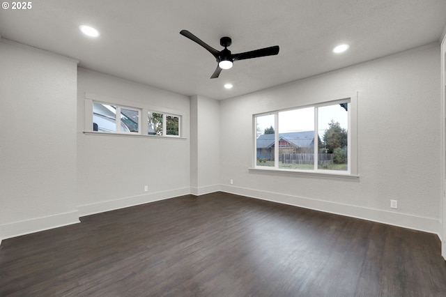 unfurnished room with ceiling fan, baseboards, dark wood finished floors, and recessed lighting