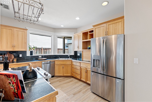 3301 Parker Ln, Springfield, OR 97477 - kitchen with appliances with stainless steel finishes, light brown cabinets, tile countertops, decorative backsplash, and recessed lighting