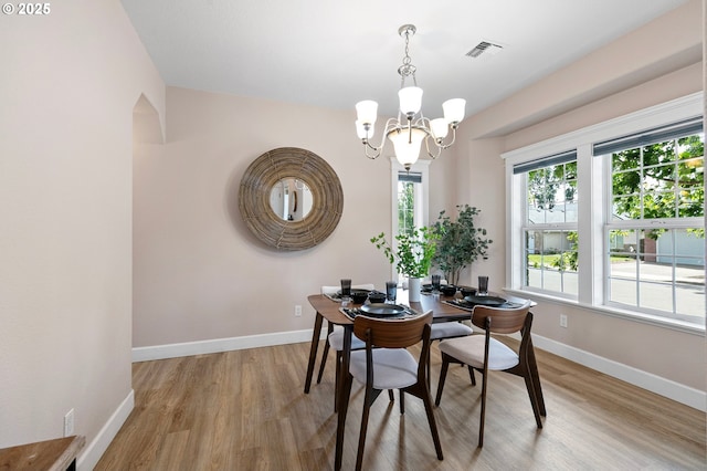 3301 Parker Ln, Springfield, OR 97477 - dining space with a chandelier and light wood finished floors