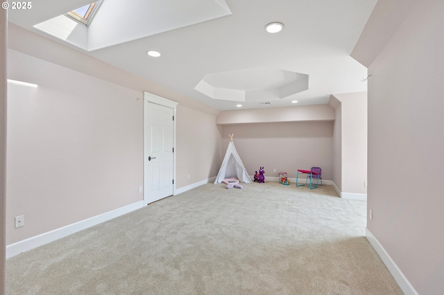 3301 Parker Ln, Springfield, OR 97477 - playroom featuring a skylight, carpet flooring, recessed lighting, and a tray ceiling