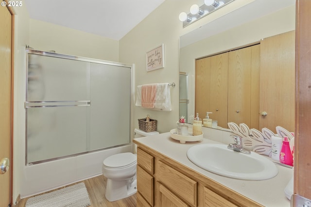 4118/4120 S E St, Springfield, OR 97478 - full bathroom with vanity, enclosed tub / shower combo, and wood finished floors