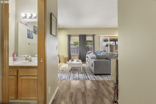 4118/4120 S E St, Springfield, OR 97478 - corridor featuring wood finished floors and a sink