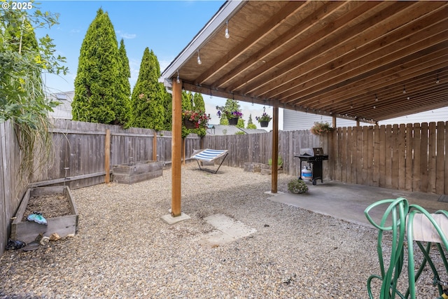 4118/4120 S E St, Springfield, OR 97478 - fenced backyard with grilling area and a patio
